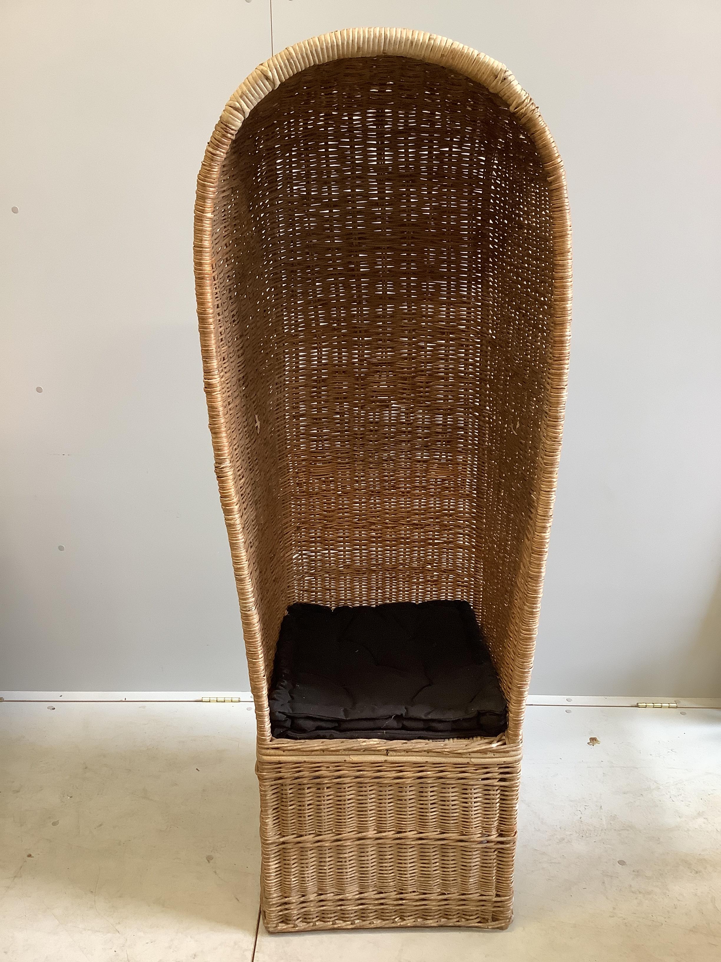 A vintage willow hall porter's chair, width 57cm, depth 49cm, height 158cm